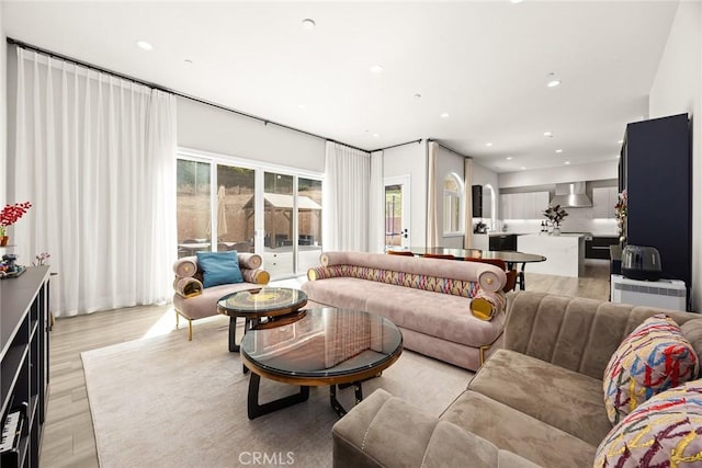 1279 Waterbrook Cir, Walnut, CA 91789 - living area with light wood finished floors and recessed lighting