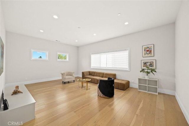 1279 Waterbrook Cir, Walnut, CA 91789 - living room featuring light wood-style flooring, recessed lighting, and baseboards