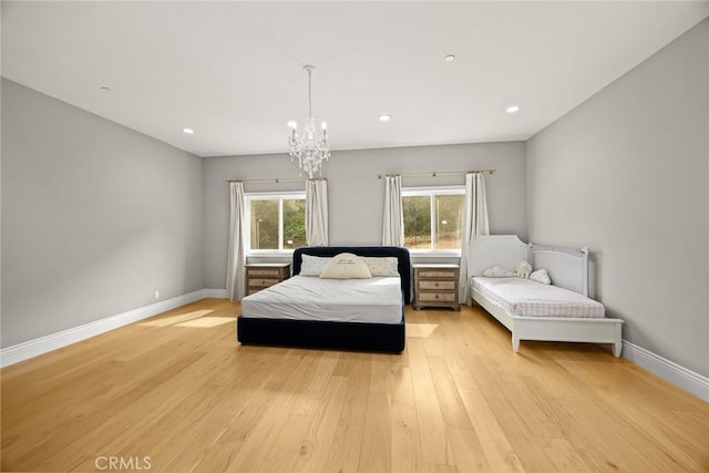 1279 Waterbrook Cir, Walnut, CA 91789 - bedroom with light wood-style floors, a chandelier, baseboards, and recessed lighting