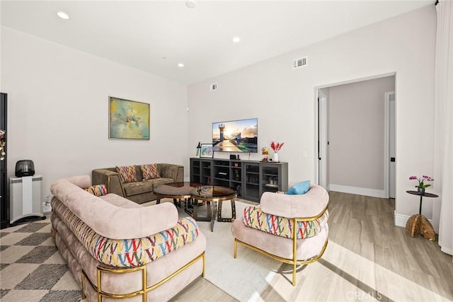 1279 Waterbrook Cir, Walnut, CA 91789 - living room with wood finished floors, recessed lighting, and baseboards