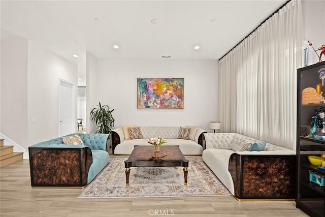1279 Waterbrook Cir, Walnut, CA 91789 - living room featuring wood finished floors, stairway, and recessed lighting