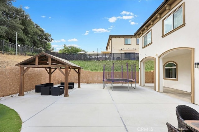 1279 Waterbrook Cir, Walnut, CA 91789 - view of patio featuring a trampoline, an outdoor living space, and a gazebo