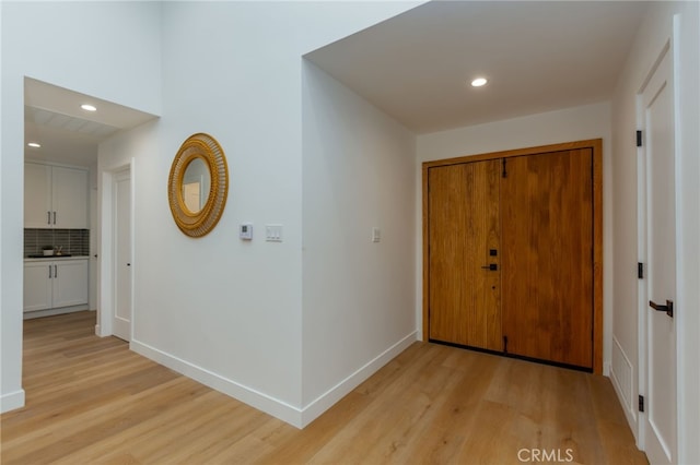 876 Ballina Ct, Newbury Park, CA 91320 - entryway with light wood-type flooring, recessed lighting, and baseboards