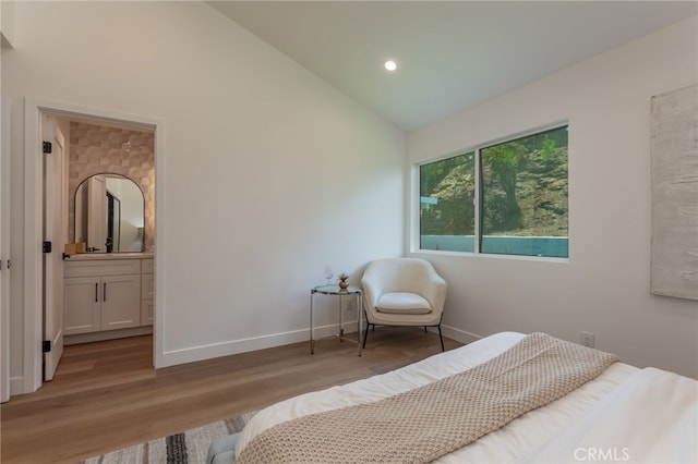 876 Ballina Ct, Newbury Park, CA 91320 - bedroom with light wood-style floors, baseboards, recessed lighting, high vaulted ceiling, and ensuite bathroom