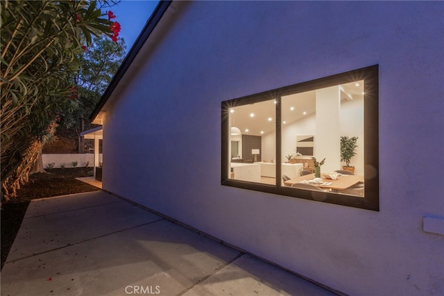 876 Ballina Ct, Newbury Park, CA 91320 - view of home's exterior with stucco siding and a patio area
