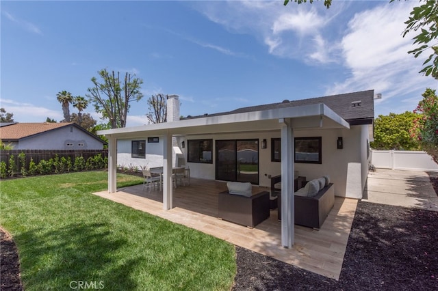 876 Ballina Ct, Newbury Park, CA 91320 - back of house featuring a patio area, stucco siding, and an outdoor living space