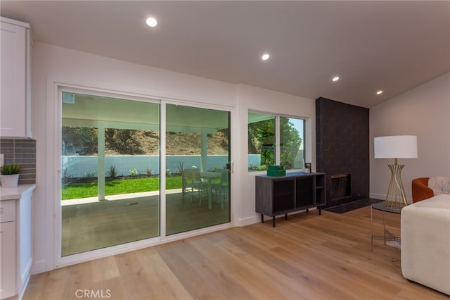 876 Ballina Ct, Newbury Park, CA 91320 - living area with a fireplace, light wood-style flooring, and recessed lighting
