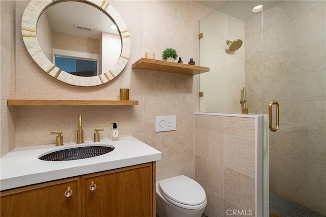 425 Tustin Ave, Newport Beach, CA 92663 - bathroom with tile walls, a shower stall, and vanity