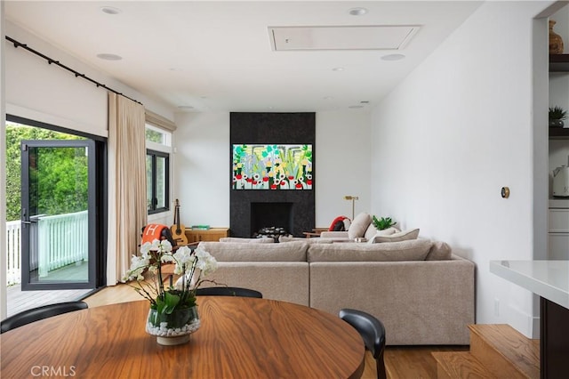 425 Tustin Ave, Newport Beach, CA 92663 - living room featuring a fireplace and wood finished floors