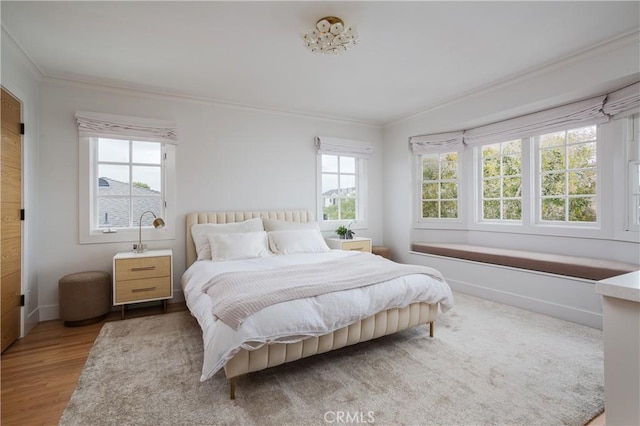 425 Tustin Ave, Newport Beach, CA 92663 - bedroom with ornamental molding and wood finished floors