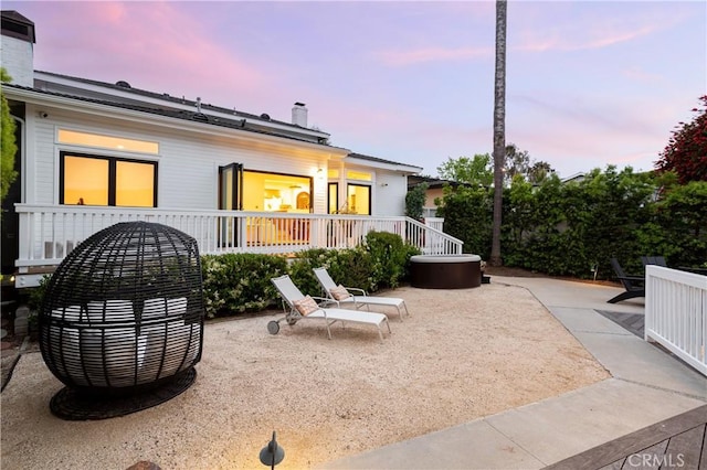 425 Tustin Ave, Newport Beach, CA 92663 - back of house with a chimney and a patio area