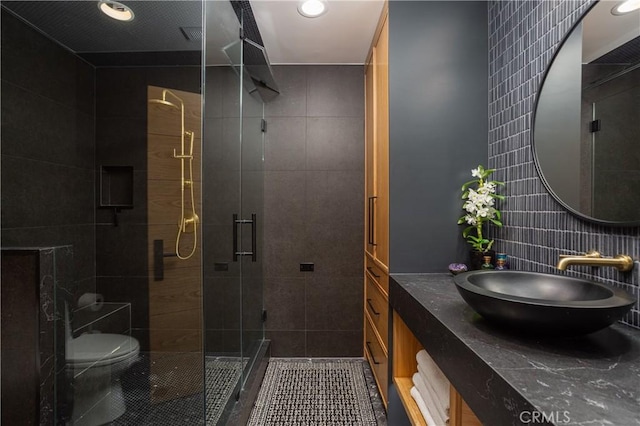 425 Tustin Ave, Newport Beach, CA 92663 - bathroom featuring tile walls, a shower stall, vanity, tile patterned floors, and recessed lighting