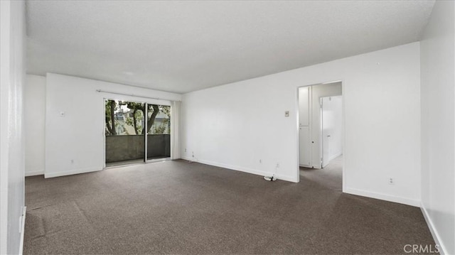 3649 Glendon Ave Unit 202, Los Angeles, CA 90034 - spare room with dark carpet and baseboards