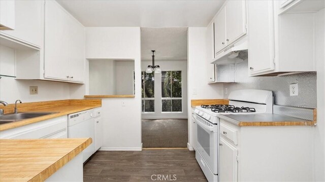 3649 Glendon Ave Unit 202, Los Angeles, CA 90034 - kitchen featuring white appliances, a sink, under cabinet range hood, dark wood-type flooring, and white cabinets