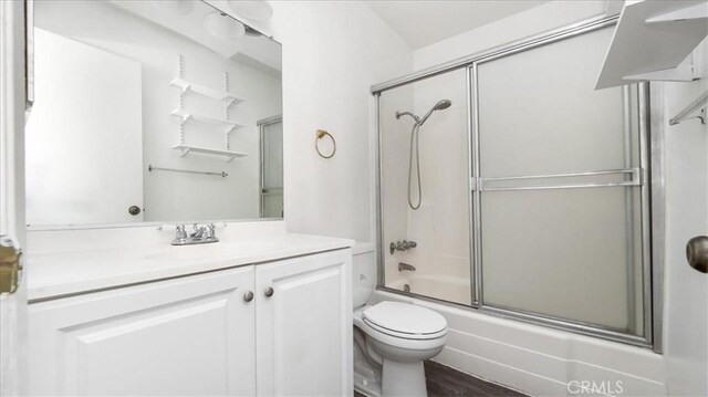 3649 Glendon Ave Unit 202, Los Angeles, CA 90034 - full bathroom with toilet, vanity, and bath / shower combo with glass door