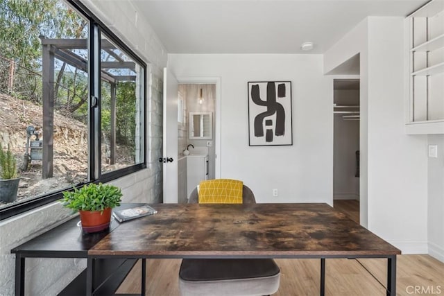 11707 Pendleton Rd, Yucaipa, CA 92399 - office space featuring wood finished floors, baseboards, and a sink