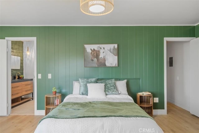11707 Pendleton Rd, Yucaipa, CA 92399 - bedroom featuring wood finished floors and a sink