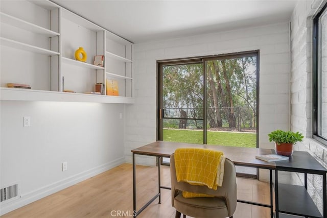11707 Pendleton Rd, Yucaipa, CA 92399 - office area featuring light wood finished floors and baseboards