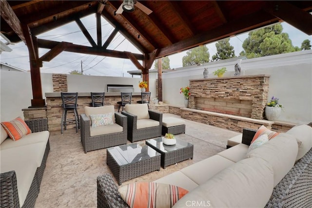 7642 Rhone Ln, Huntington Beach, CA 92647 - fenced backyard with an outdoor hangout area, a gazebo, a patio, and a ceiling fan