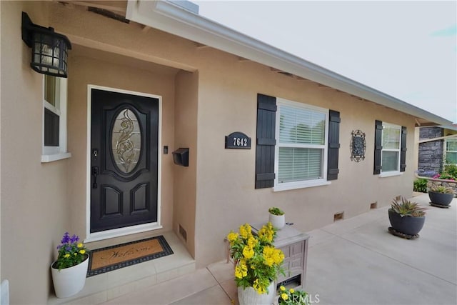7642 Rhone Ln, Huntington Beach, CA 92647 - property entrance with stucco siding