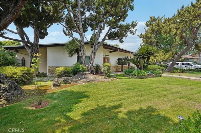 1721 S 3rd Ave, Arcadia, CA 91006 - view of front of property with stucco siding, a front yard, and stone siding