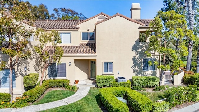 3 Fleurance St, Laguna Niguel, CA 92677 - view of front facade with a tiled roof, a chimney, stucco siding, and a gate