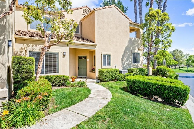 3 Fleurance St, Laguna Niguel, CA 92677 - view of front of property featuring a front yard, stucco siding, and a tile roof