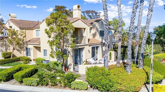 3 Fleurance St, Laguna Niguel, CA 92677 - view of front of house with a balcony, a tiled roof, and stucco siding