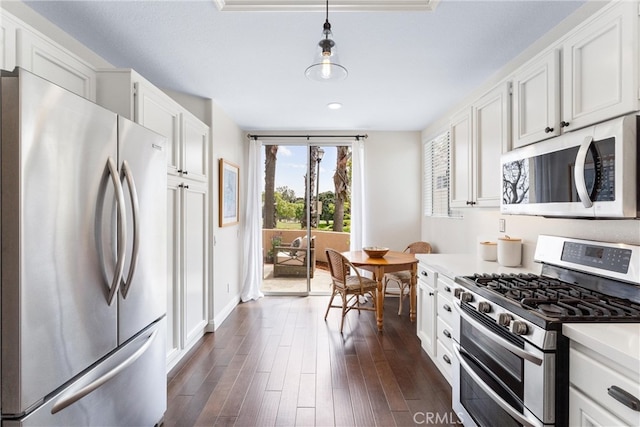 3 Fleurance St, Laguna Niguel, CA 92677 - kitchen with stainless steel appliances, light countertops, white cabinets, dark wood finished floors, and recessed lighting