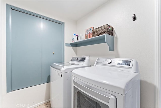3 Fleurance St, Laguna Niguel, CA 92677 - washroom featuring washer and clothes dryer and light tile patterned flooring