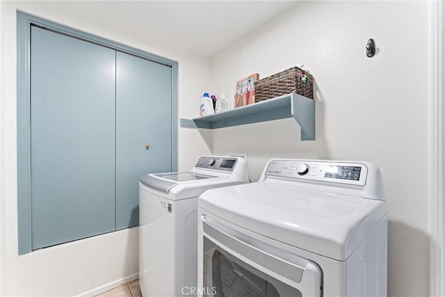3 Fleurance St, Laguna Niguel, CA 92677 - laundry area with washing machine and clothes dryer and light tile patterned floors