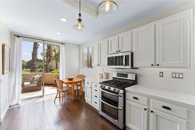 3 Fleurance St, Laguna Niguel, CA 92677 - kitchen with appliances with stainless steel finishes, white cabinetry, light countertops, dark wood finished floors, and recessed lighting
