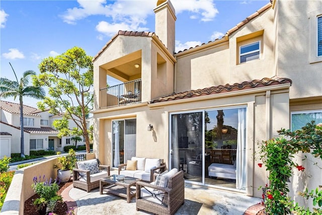 3 Fleurance St, Laguna Niguel, CA 92677 - back of property featuring a balcony, an outdoor hangout area, a patio, a chimney, and a tile roof