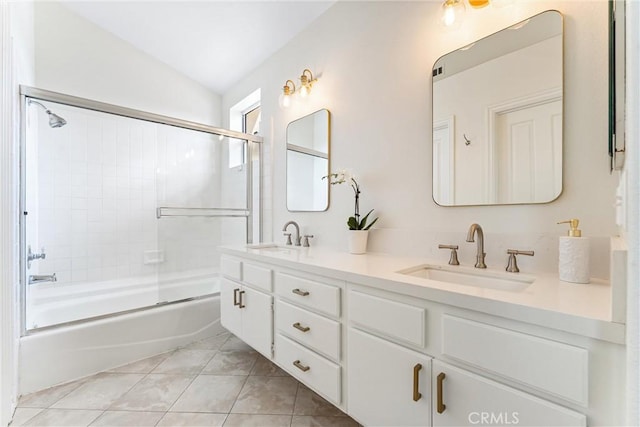 3 Fleurance St, Laguna Niguel, CA 92677 - bathroom featuring double vanity, combined bath / shower with glass door, vaulted ceiling, and tile patterned flooring