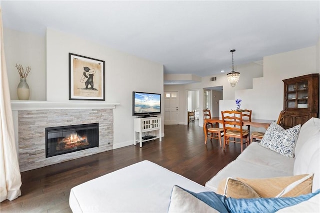3 Fleurance St, Laguna Niguel, CA 92677 - living room featuring hardwood / wood-style floors and a stone fireplace