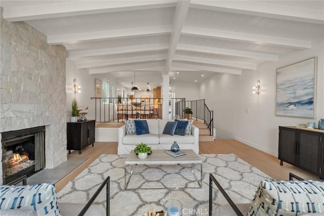 1529 Steinhart Ave, Redondo Beach, CA 90278 - living room with wood finished floors, stairway, a large fireplace, and baseboards