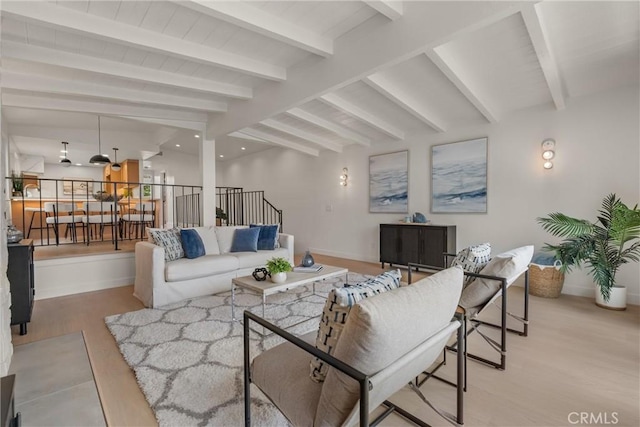 1529 Steinhart Ave, Redondo Beach, CA 90278 - living area featuring baseboards, light wood-style flooring, beamed ceiling, and stairway