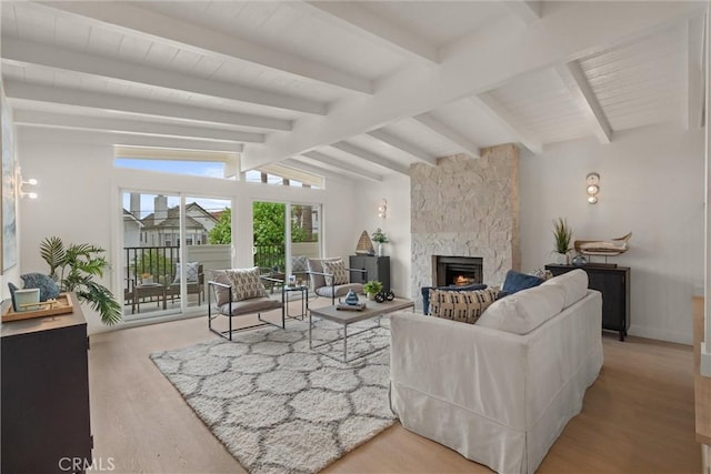 1529 Steinhart Ave, Redondo Beach, CA 90278 - living area featuring a stone fireplace, wood finished floors, and baseboards