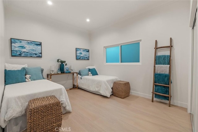 1529 Steinhart Ave, Redondo Beach, CA 90278 - bedroom with crown molding, light wood-style flooring, baseboards, and recessed lighting