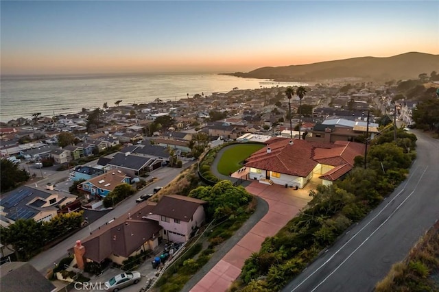 1000 Park Ave, Cayucos, CA 93430 - aerial view at dusk of a residential view and a water and mountain view