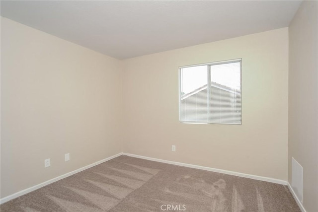 44124 Sundance Ct, Lancaster, CA 93535 - carpeted spare room with baseboards