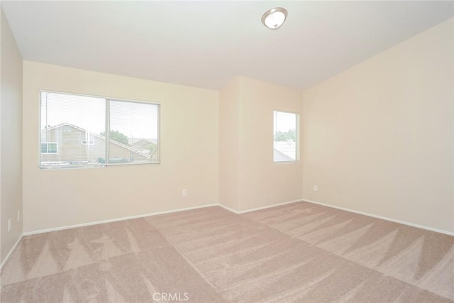 44124 Sundance Ct, Lancaster, CA 93535 - empty room with carpet floors and baseboards