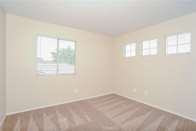44124 Sundance Ct, Lancaster, CA 93535 - carpeted spare room with baseboards