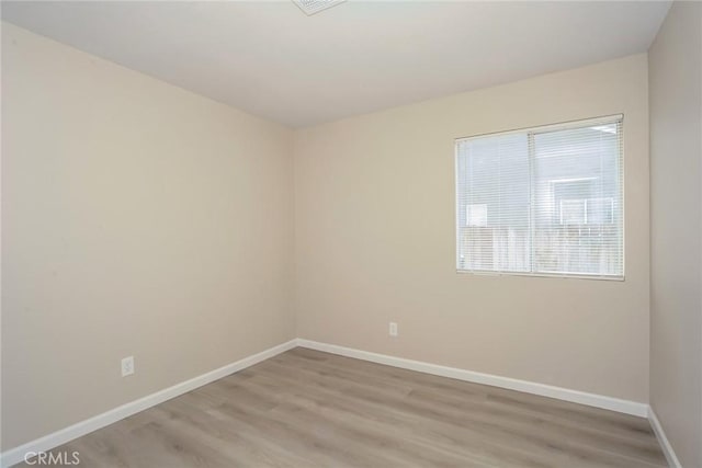 44124 Sundance Ct, Lancaster, CA 93535 - unfurnished room featuring baseboards and light wood-style flooring