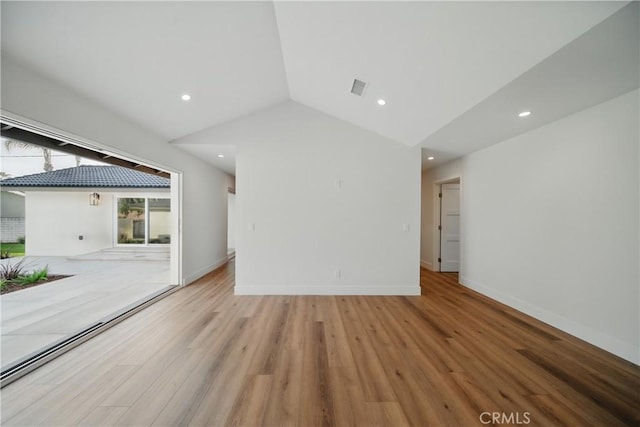 830 Huerta Verde Rd, Glendora, CA 91741 - unfurnished living room with vaulted ceiling, wood finished floors, recessed lighting, and baseboards