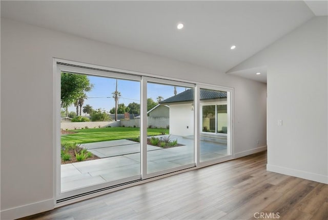 830 Huerta Verde Rd, Glendora, CA 91741 - doorway with vaulted ceiling, light wood-style flooring, baseboards, and recessed lighting