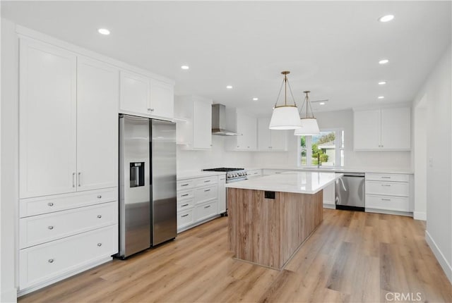 830 Huerta Verde Rd, Glendora, CA 91741 - kitchen with appliances with stainless steel finishes, a center island, light wood-type flooring, light countertops, and white cabinets
