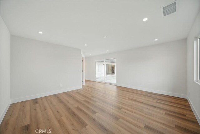 830 Huerta Verde Rd, Glendora, CA 91741 - unfurnished living room with light wood finished floors, recessed lighting, and baseboards