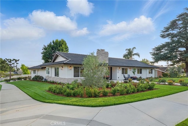 830 Huerta Verde Rd, Glendora, CA 91741 - single story home featuring a chimney, a front lawn, stucco siding, and stone siding