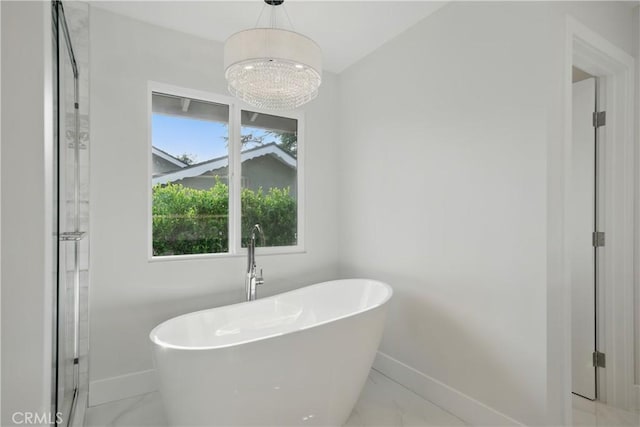 830 Huerta Verde Rd, Glendora, CA 91741 - full bathroom featuring marble finish floors, baseboards, a soaking tub, a chandelier, and a stall shower